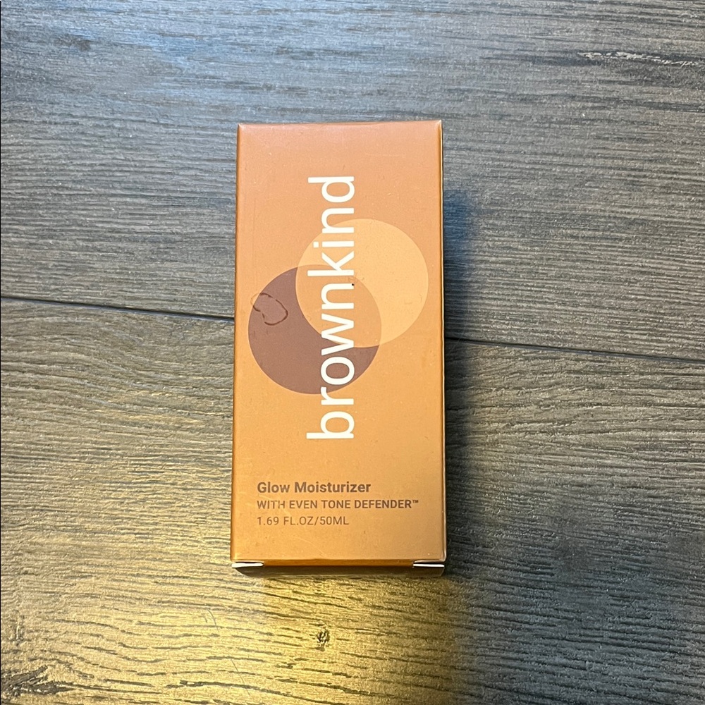 Brownkind Glow Moisturizer with Even Tone Defender. New in package. 50 ML